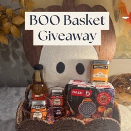 We’re creeping it real with a spooky surprise! a halloween themed gift basket