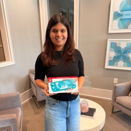 woman holding a game