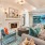 Large media lounge with fireplace and ample seating 